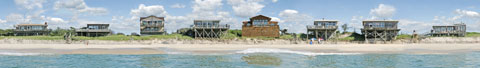 Panorama of buildings viewed from the ocean side of Fire Island. Large size gallery print.