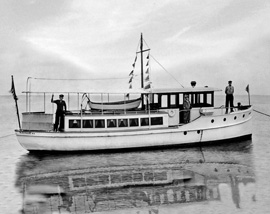 Steam boat in Fire Island Marina, black and white photograph, digitally restored and printed