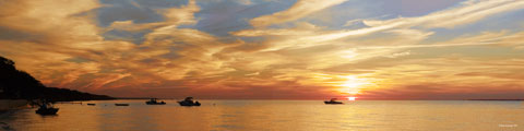 Boats on the ocean at sunset. Large size panoramic photograph.